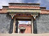 Tibet Kailash 04 Saga to Kailash 11 Old Drongpa Gompa Entrance Here is the entrance to the Sakya-order gompa in Old Drongpa, Note the walls are the same dark ash grey colour as the walls at Sakya Gompa.